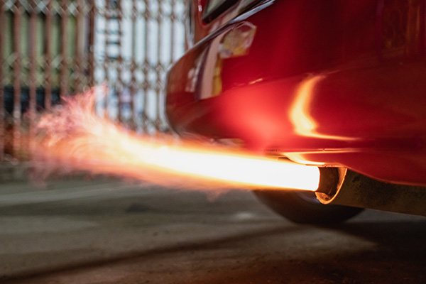 Why Does Your Car Make Weird Noises From The Exhaust When Accelerating?